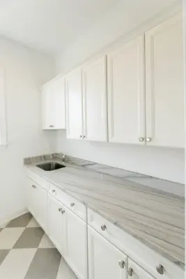 Laundry Spaces — Countertop Installation Services project by Southern Stone & Cabinets