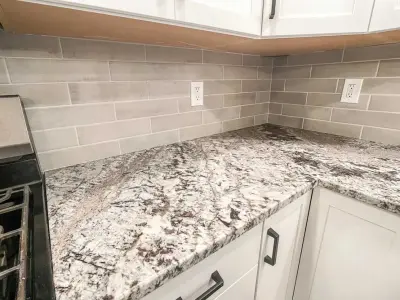 Lennon Granite - Kitchen Renovation — Countertop Installation Services project by Momax Marble