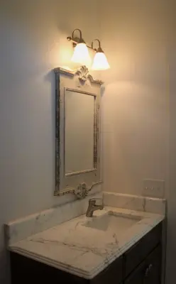 Eden Retreat Guest Bath and Powder Room Renovation with Marble Countertops — Countertop Installation Services project by Bison Countertops