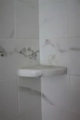 Eden's Little Master Bath Remodel with Marble Countertops, Tub Surround, and Shower Tile — Countertop Installation Services project by Bison Countertops