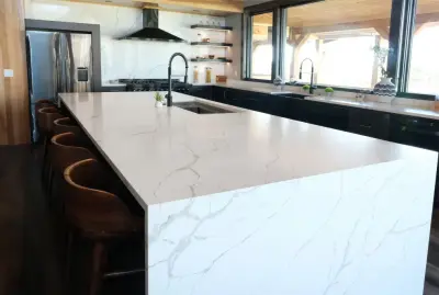 Contemporary Kitchen with Black Cabinets and Marbled Quartz — Countertop Installation Services project by WilgusIQ