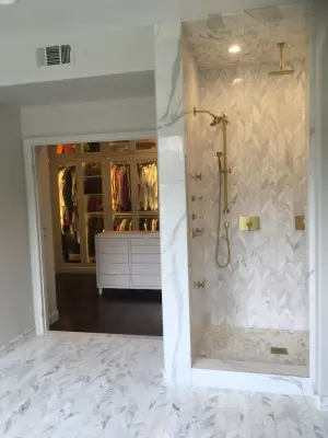 Calcutta Gold Master Bathroom Renovation — Countertop Installation Services project by Natural Stone Fabricators