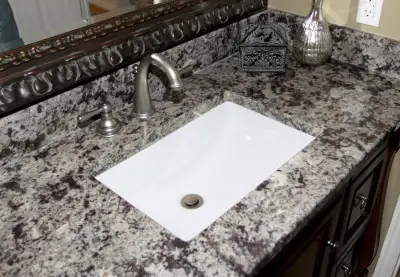 Charcoal Marble Vanity with Top — Countertop Installation Services project by Sandia Marble