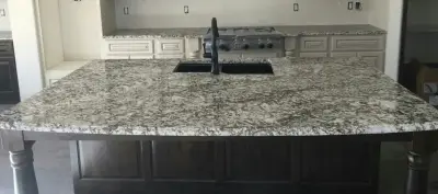 Exposed Brick Rustic Kitchen — Countertop Installation Services project by Sandia Marble