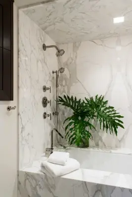 Olmos Penthouse Guest Bathroom — Countertop Installation Services project by Delta Granite And Marble, Inc.