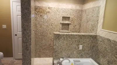 Tipton County Bathroom Renovation with Venetian Ice Granite — Countertop Installation Services project by Superior Stone Works