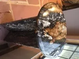 Ouro Preto Stone — Countertop Installation Services project by Anything Granite