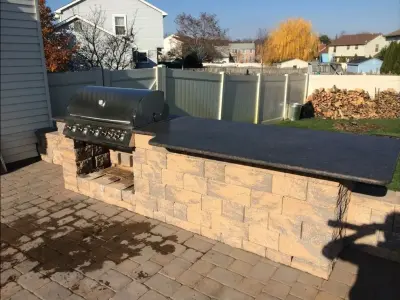 Outdoor Grill with Leather-Finished Granite — Countertop Installation Services project by Ilkem Marble & Granite Inc