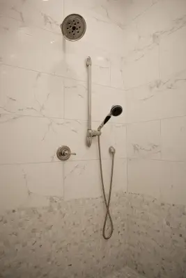 Ceramic and Stone Tile Washroom — Countertop Installation Services project by Bottega Design Gallery