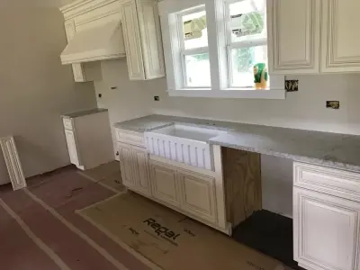 Quartz Kitchen with Portico Cream — Countertop Installation Services project by S.A.K Granite