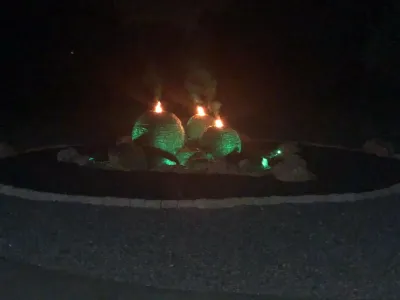 Triple Stacked Slate Sphere Fountainscape with Fire & Color-Change LEDs — Landscape Construction project by Landvista Aquascapes