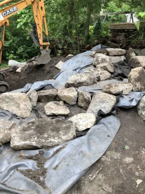 20' Stream and Waterfall with Natural Stone Wall and Patio — Landscape Construction project by Landvista Aquascapes in Cherry Hill