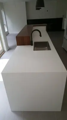 Pristine White Caesarstone Quartz with a Waterfall Edge — Countertop Installation Services project by Ohio Valley Solid Surface