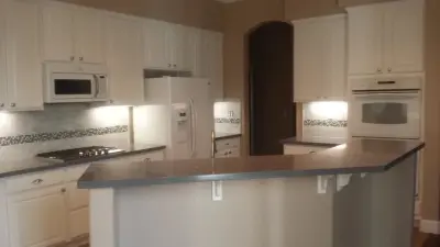 Marble White Kitchen Renovation — Countertop Installation Services project by Family Floors & More