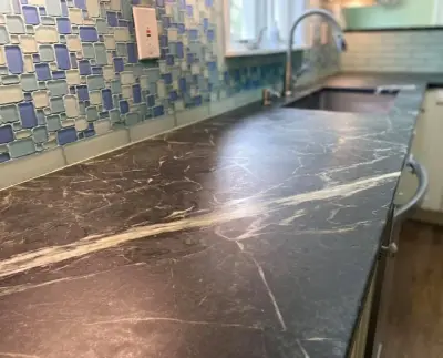 Renovated Pacific Soapstone Surround and Island — Countertop Installation Services project by Garden State Soapstone