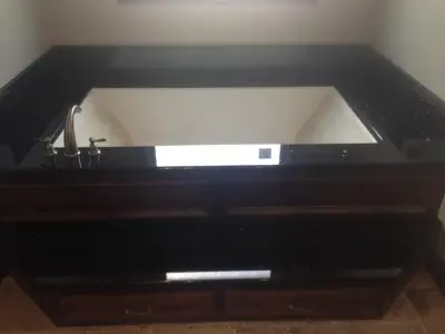 Restrooms — Countertop Installation Services project by StoneWorks By Design