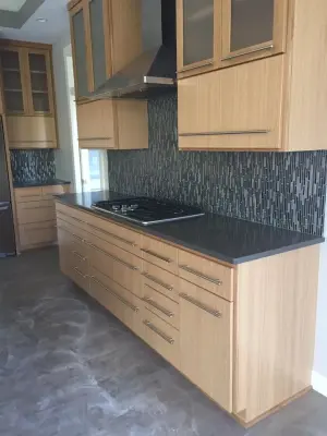 Gray Quartz Kitchen with Sake Finish — Countertop Installation Services project by The Pinske Edge