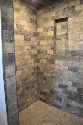 Stone Shower Renovation — Countertop Installation Services project by Kemper Flooring Inc.