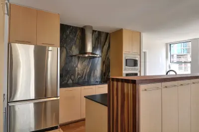 Quartzite Kitchen and Wetbar by Sandalus — Countertop Installation Services project by Aria Stone Gallery