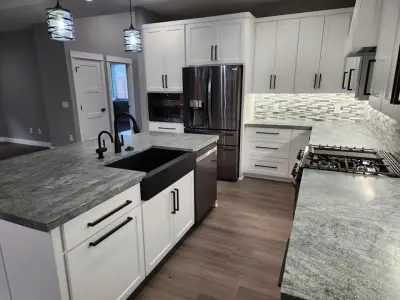 Ocean Mist Honed Quartzite — Countertop Installation Services project by West Coast Monument & Sign LLC