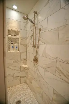 Seattle Condominium Primary Bathroom — Countertop Installation Services project by Washington Marble Works