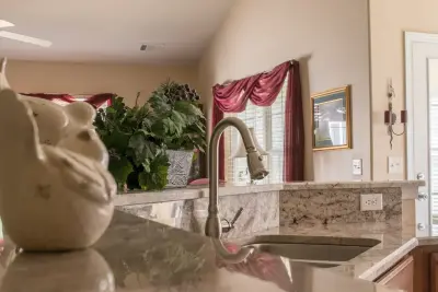 Bordeaux Sienna Granite Kitchen Countertops — Countertop Installation Services project by East Coast Granite & Tile