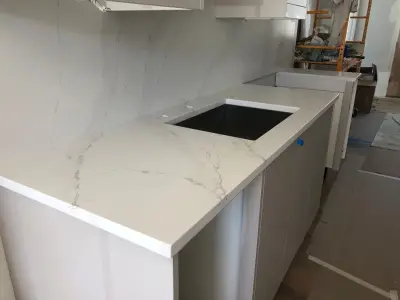 Eternal Gold Calacatta Silestone with Suede Finish — Countertop Installation Services project by Gomez Granite Countertops