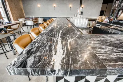 Marble Bar at Stirr Restaurant — Countertop Installation Services project by Aria Stone Gallery