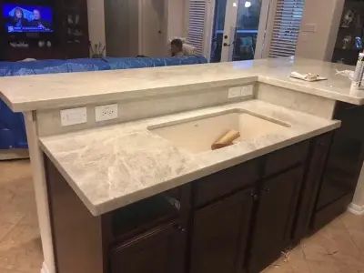 Quartzite of SugarLand and Taj Mahal — Countertop Installation Services project by Stones & Designers