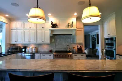 Bright White Kitchen Island — Countertop Installation Services project by Italian Marble & Granite Inc