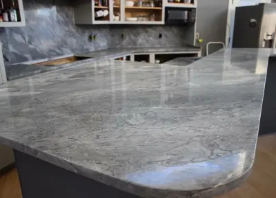 Premium White Marble with Complete Backsplash — Countertop Installation Services project by Gomez Granite Countertops