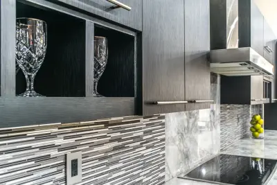 Elevated White Marble Kitchen Surfaces — Countertop Installation Services project by East Coast Granite & Tile