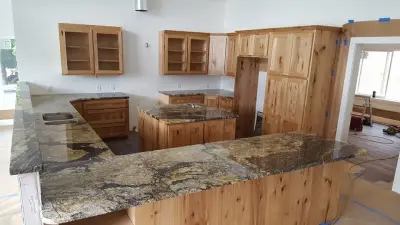 Hickory Cabinets with "Supreme Gold" Granite — Countertop Installation Services project by Cornerstone Custom Granite,LLC