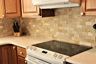 Classic Kitchen featuring White Quartz — Countertop Installation Services project by Merlino Marble And Granite