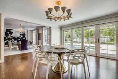 Dalmata Marble Accent Wall and Dining Area Renovation — Countertop Installation Services project by Aria Stone Gallery