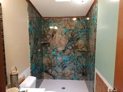 Tyvarian Navajo Shower Enclosure — Countertop Installation Services project by Sandia Marble