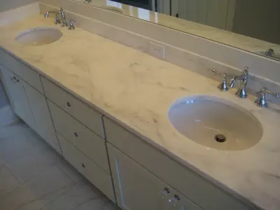 Calcutta Gold Marble Vanity — Countertop Installation Services project by LaBruyere Stone
