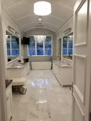 Light-Colored Bathroom — Countertop Installation Services project by Tex-San Granite