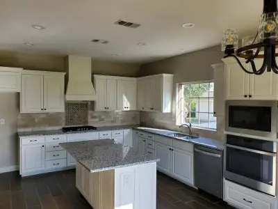 Light Kitchen and Bathroom — Countertop Installation Services project by Tex-San Granite