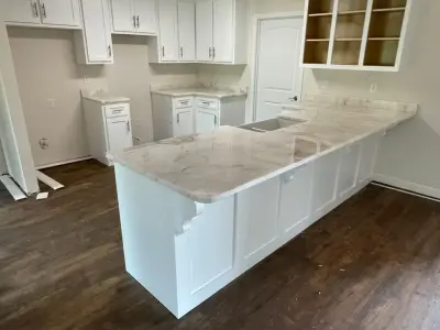 Stunning White Dolomite Countertops in a Bright Kitchen — Countertop Installation Services project by Paradise Granite LLC