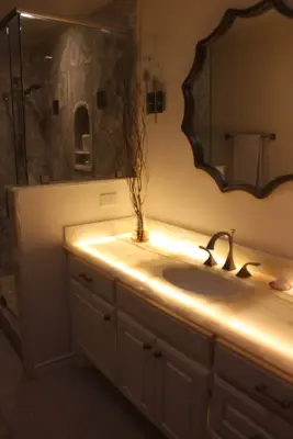 Distinctive White Onyx Bathroom — Countertop Installation Services project by Granite Division Inc.