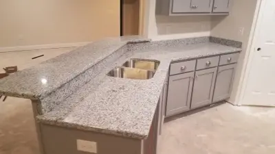 Platinum White Granite - Countertops for Kitchens — Countertop Installation Services project by Paradise Granite LLC