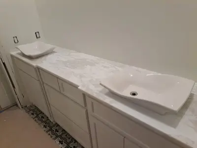 Marble Countertops for Bathrooms in White Rhino Style — Countertop Installation Services project by Paradise Granite LLC