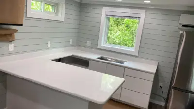 Quartz Countertops with White Star Finish — Countertop Installation Services project by Paradise Granite LLC