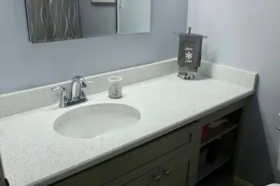 White Quartz Countertop — Countertop Installation Services project by Merlino Marble And Granite