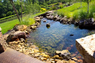 Backyard Creek — Landscape Construction project by Lanoha Nurseries