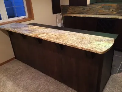 Golden River Granite Counter — Countertop Installation Services project by Elegant Creations Granite Marble & More LLC