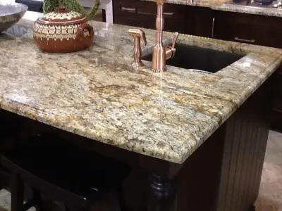 Yellow River granite countertops and complete backsplash — Countertop Installation Services project by Granite 4 Less