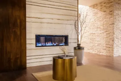 Zebrino White Marble Feature Fireplace — Countertop Installation Services project by Aria Stone Gallery