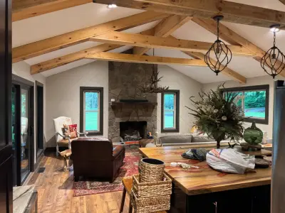 Modern Rustic Kitchen and Living Room Renovation with Visible Timber Beams — Home Renovation & Remodeling Services project by Big League Builders And Remodelers